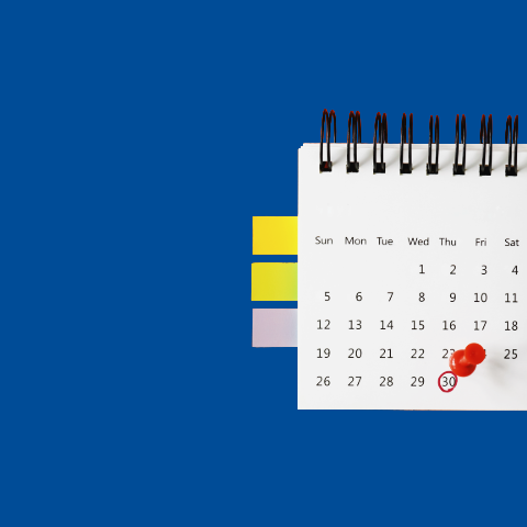 Calendar with red push pin on day